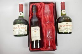 A bottle of Frapin Superior Old Grande Champagne Cognac in a presentation box with two glasses,