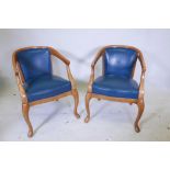 A pair of contemporary horseshoe back open armchairs with leatherette seats and backs, raised on