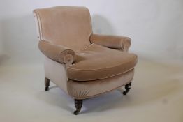 Cornelius V. Smith, a good Victorian armchair with bow front and bolster style arms, raised on