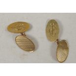 A pair of 9ct gold cuff links, 6g