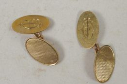 A pair of 9ct gold cuff links, 6g