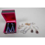 Six pairs of assorted silver earrings
