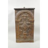 A C19th Continental oak candle box with carved decoration, 9½" x 6", 16½" high