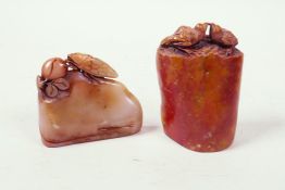 Two carved soapstone seals, one carved with lovebirds, the other with cicada and fruit, 3" high