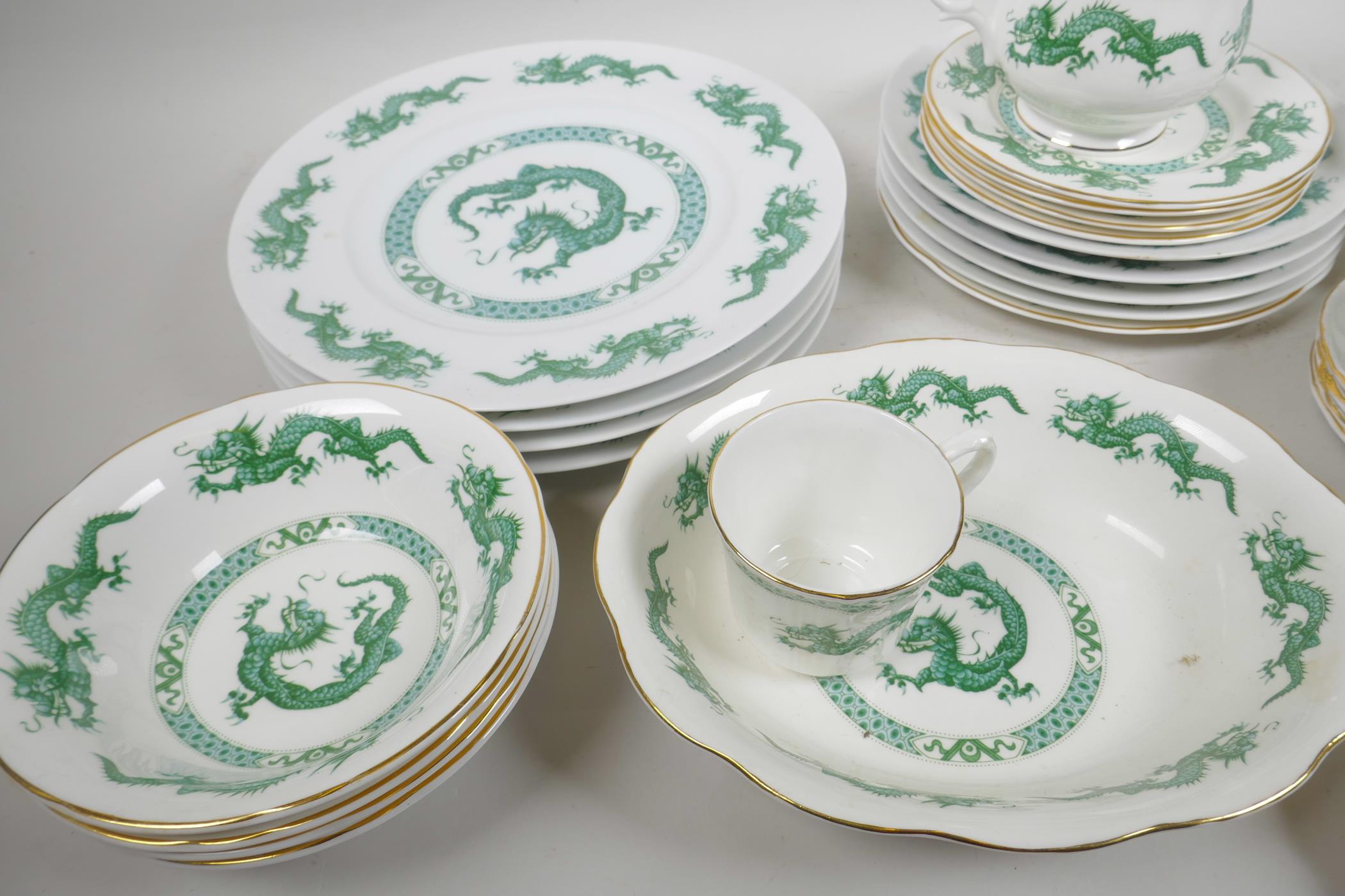 A Newcastle on Tyne China four place setting dragon pattern dinner and tea service - Image 3 of 4