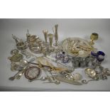 A quantity of silver plated wares including cruet sets, figurines, flatware etc