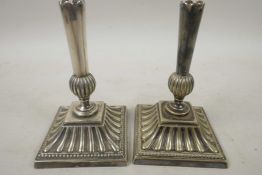 A pair of Mappin & Webb Princess Plate taper holders on ribbed square bases, 4½" high