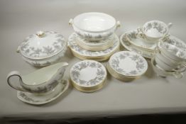 A Wedgwood 'Ashford' pattern six place dinner service including two tureens, vegetable dish, oval