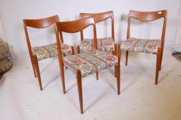 A set of four Norwegian mid century teak 'Bambi' 'Model 65' dining chairs by Rolf Rastad and Adolf