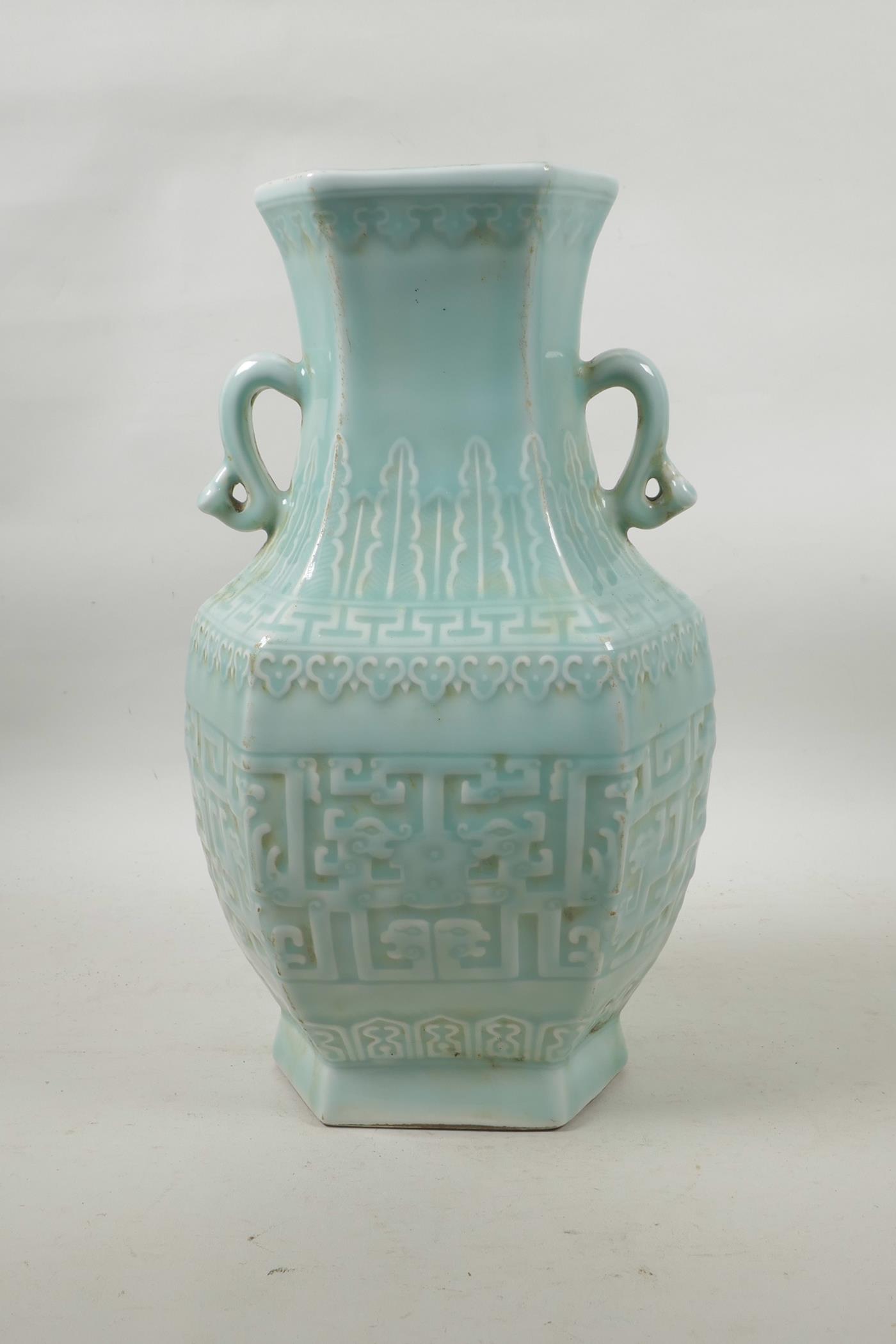 A Chinese celadon glazed porcelain two handled vase with archaic underglaze decoration, seal mark to - Image 3 of 4