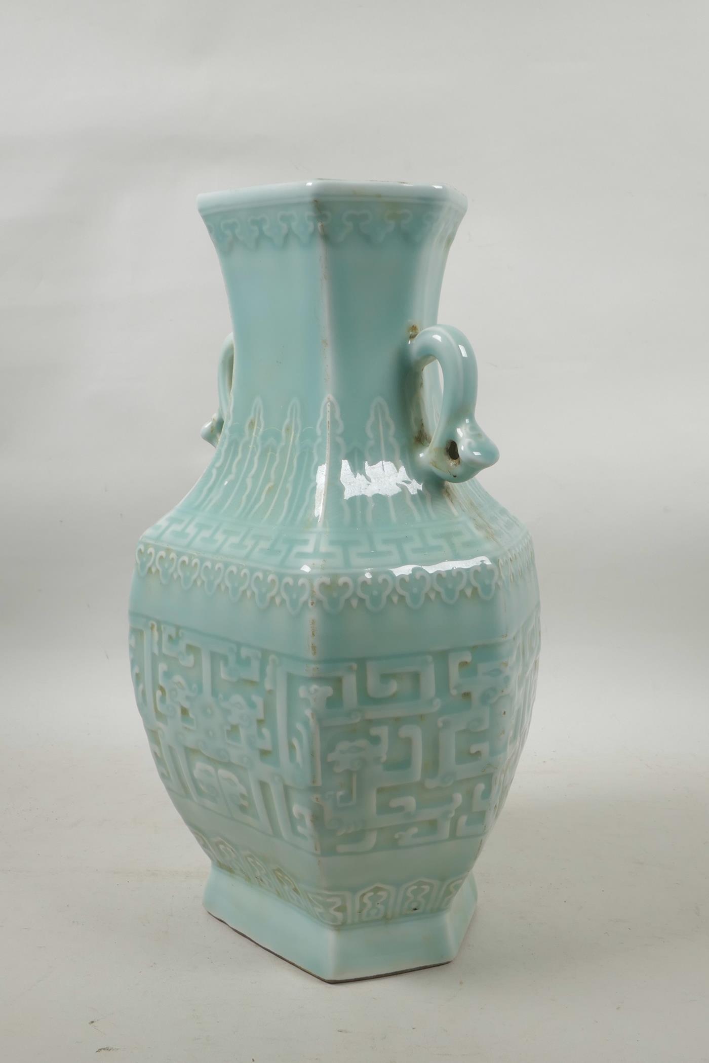 A Chinese celadon glazed porcelain two handled vase with archaic underglaze decoration, seal mark to - Image 2 of 4