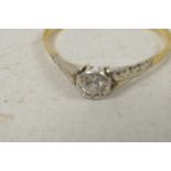 An 18ct gold set single stone diamond ring, size 'R'