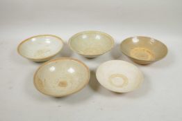 A collection of five Chinese Song and Song style conical pottery bowls, A/F, largest 6½" diameter
