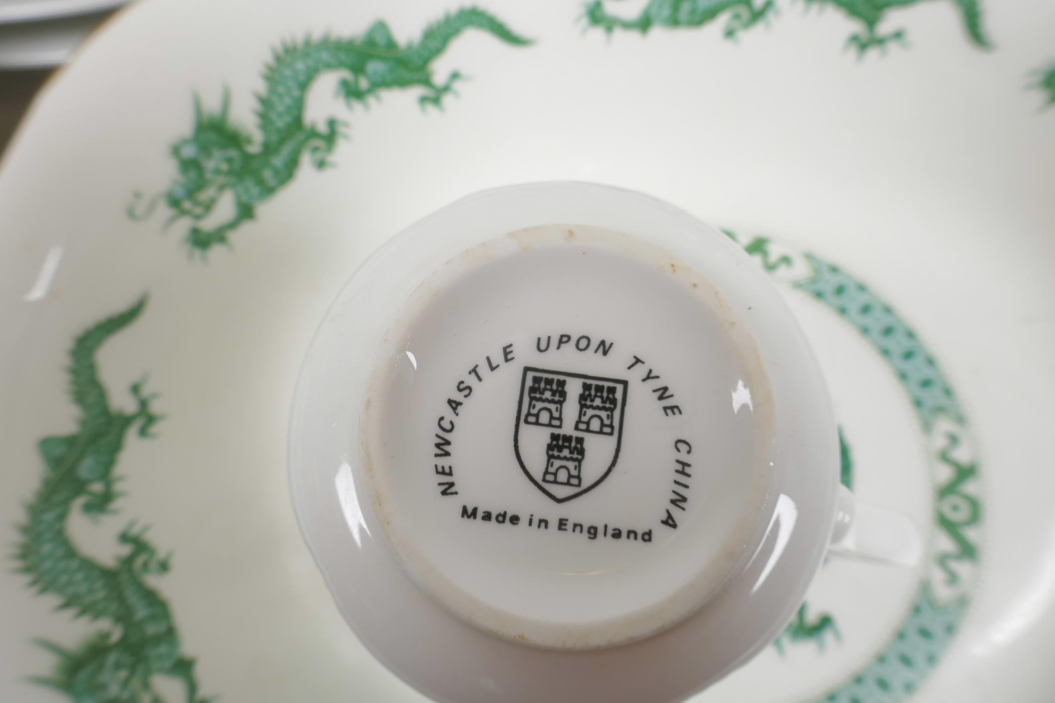 A Newcastle on Tyne China four place setting dragon pattern dinner and tea service - Image 4 of 4