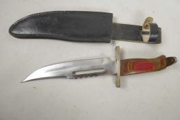 An unusual Bowie knife with laminated wood handle, 13" long, in leather sheath
