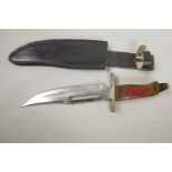 An unusual Bowie knife with laminated wood handle, 13" long, in leather sheath