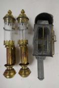 An original candle lit rear carriage lamp with bevelled glass and coloured panels, A pair of