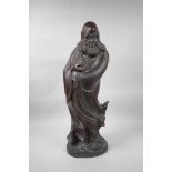 A Chinese carved hardwood Lohan, 24" high