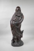 A Chinese carved hardwood Lohan, 24" high