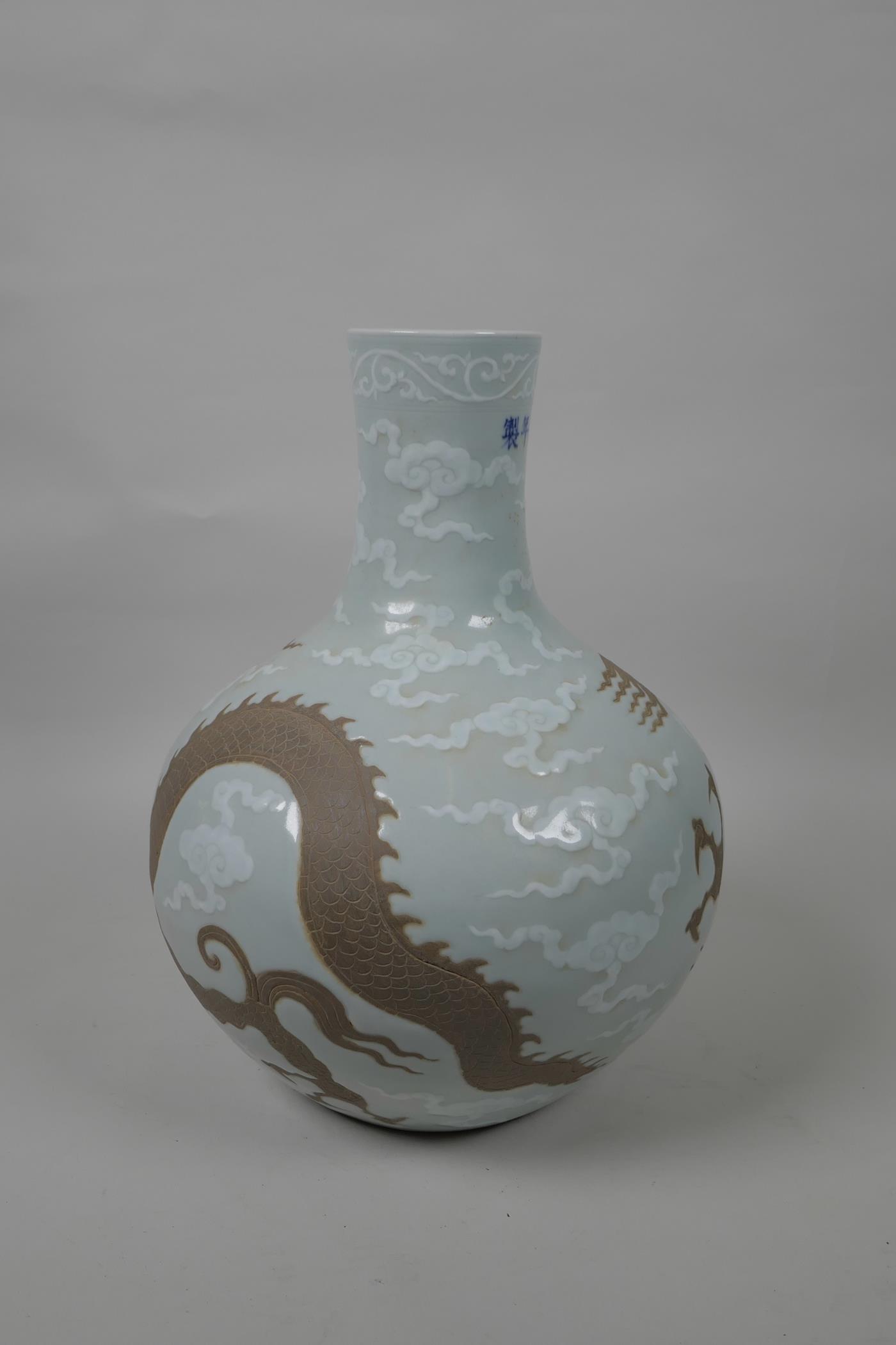 A Chinese Ming style red and white porcelain vase decorated with a red dragon in flight, 6 character - Image 3 of 5