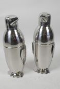 A pair of novelty plated cocktail shakers modelled in the form of penguins, 9" high