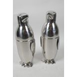 A pair of novelty plated cocktail shakers modelled in the form of penguins, 9" high