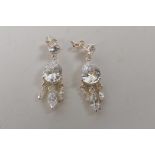 A pair of silver and cubic zirconium set drop earrings