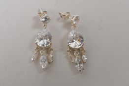 A pair of silver and cubic zirconium set drop earrings