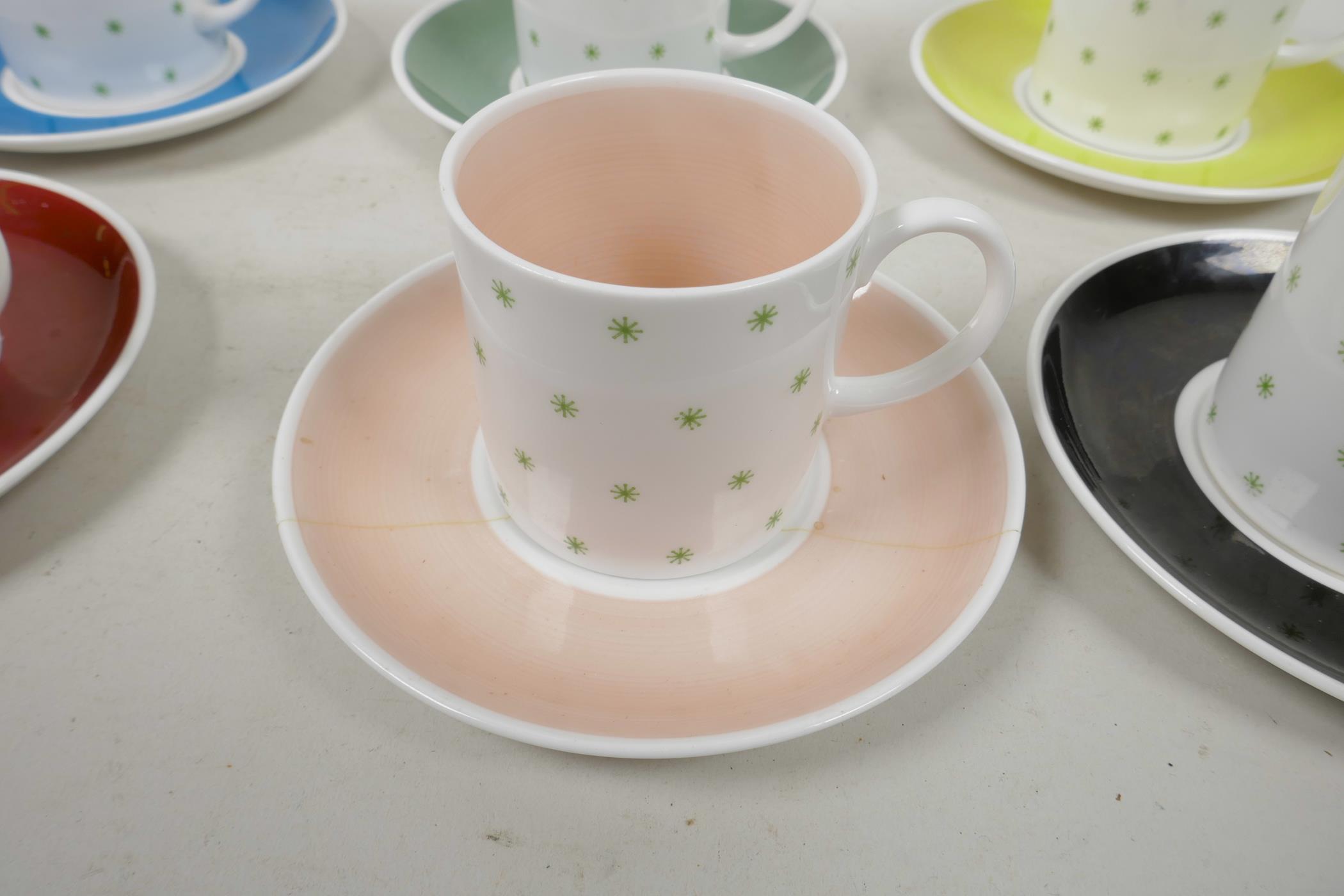 A Susie Cooper six cup and saucer coffee set with green star decoration, A/F, 5½" diameter - Image 5 of 9