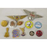 A collection of enamel pin badges including Delta and TWA Airlines etc