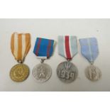 Four Eastern European medals from the mid C20th and Second World War, to include: The Polish Victory