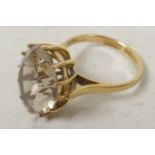 A 9ct gold dress ring set with large oval cut stone, size 'L'