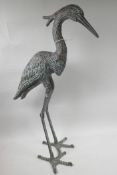 A metal garden figure of a heron, 27½" high