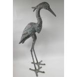 A metal garden figure of a heron, 27½" high