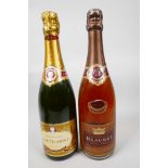 Two bottles of champagne, one J de Telmont Grande Reserve and one Beaumet Rose Brut