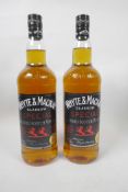 Two one litre bottles of Whyte and Mackay special blended Scotch whisky