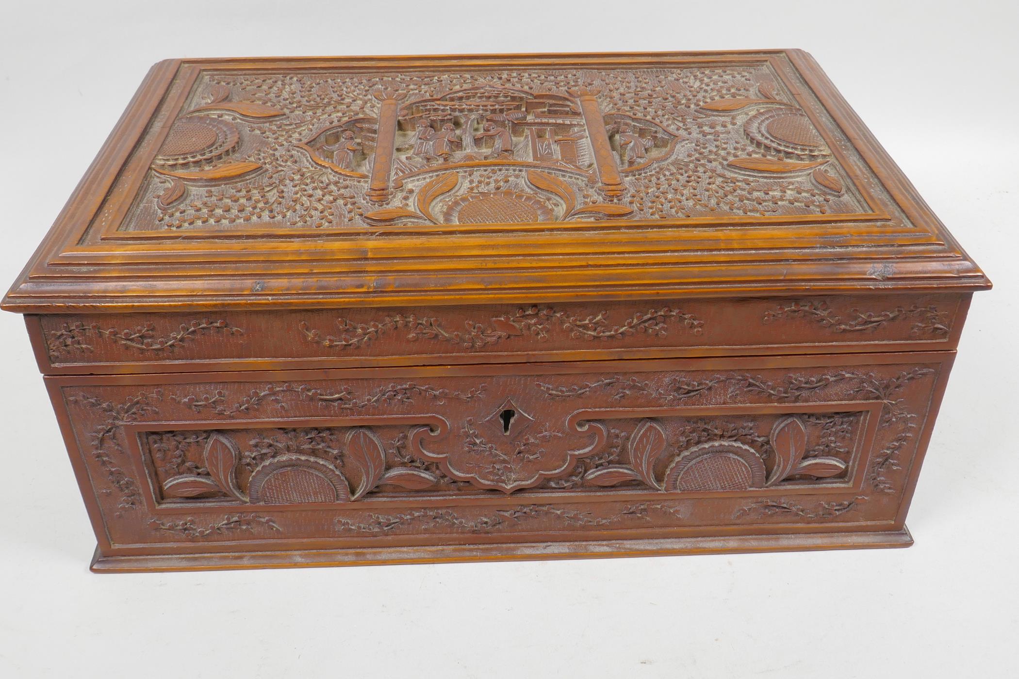 A Chinese carved hardwood box decorated with figures in a garden scene, 12¼" x 5¾" x 8" - Image 3 of 3