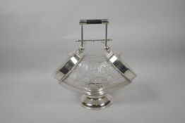 A silver plated and cut glass two sided biscuit barrel, 11" high