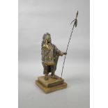 A bronze of Sitting Bull, with gilt and silvered highlights, on a tiered agate stand, spear 14" long