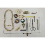 A pietra dura set brooch and two mosaic brooches, an Art Deco white metal and paste set necklace,