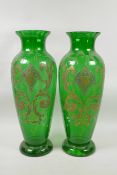 A pair of Bohemian green glass vases with raised gilt decoration, 16" high