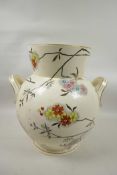 A large Staffordshire two handled vase, decorated with flowers, 13" high