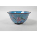 A Chinese cloisonne bowl with prunus blossom decoration, 6" diameter