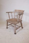 A late C19th elm smokers bow chair
