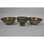 Three antique Islamic enamelled brass bowls with floral and script decoration, 5" diameter, together
