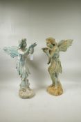 A pair of metal garden figures of fairies, 20" high