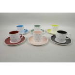 A Susie Cooper six cup and saucer coffee set with green star decoration, A/F, 5½" diameter