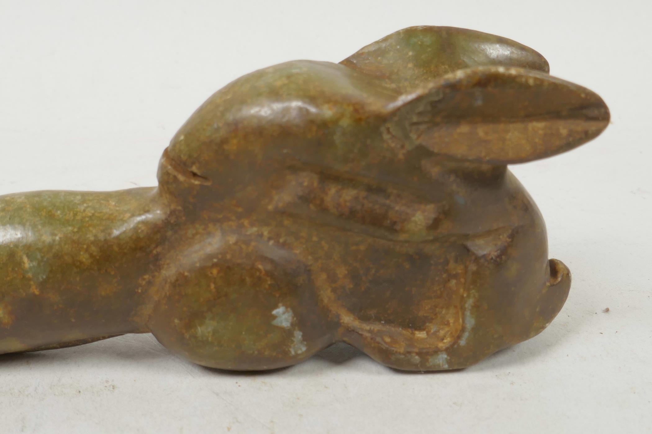 A carved hardstone phallic ornament with stylised rabbit base, 5" long - Image 2 of 3