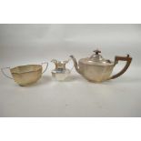 An Art Deco silver three piece tea set, hallmarked Brimingham 1932, 1060g