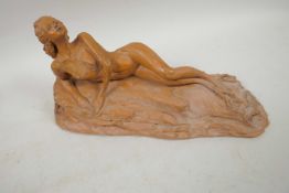 Barbara Stride, a terracotta maquette of a mermaid lying on a rock, 10½" long, signed on base
